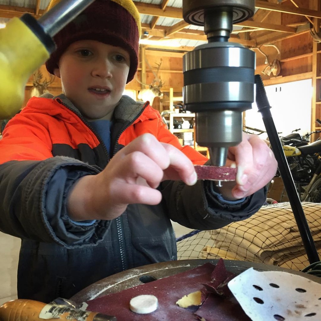 Cooper sanding the axles